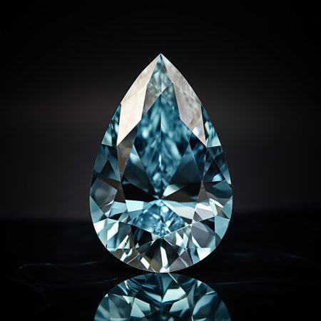 Macro shot of a blue diamond on a dark background with reflectionの素材
