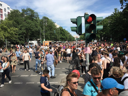 Berlin, Germany - June 9, 2019: Crowd attending the Carnival of Cultures Parade (Karneval der Kulturen Umzug) - a multicultural music festival in Kreuzberg in sunny weatherのeditorial素材