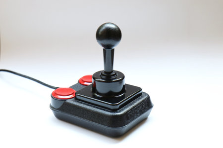 BERLIN - AUGUST 27, 2019: Classic Retro Joystick Competition Pro from the Eighties on white. It was very popular with Commodore Amiga and C64 Gaming Computersのeditorial素材