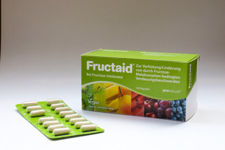 BERLIN - AUGUST 30, 2019: Box of Fructaid Capsules and a Blister Pack. A medicine that helps people with Fructose Intolerance / Malabsortion to digest fruit sugar that is in fruits, vegetables and many other food.のeditorial素材