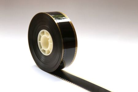 Small 35mm Movie Trailer Film Roll on a Bobby. This is a 2-3 minute long film strip.の写真素材