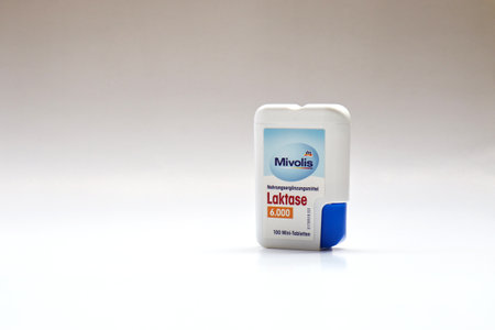 BERLIN - SEPTEMBER 02, 2019: Box of Lactase Pills / Tablets. A medicine that helps people with Lactose Intolerance. Lactase is the Enzyme that breaks down lactose so that it can be digested.のeditorial素材
