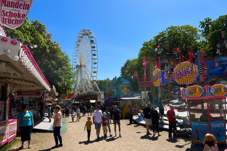 Crowded Fun Fair, Carnival Neukoellner Maientageのeditorial素材