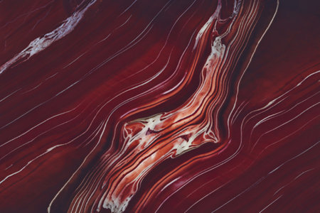 polished marble background with a deep red hue.の写真素材
