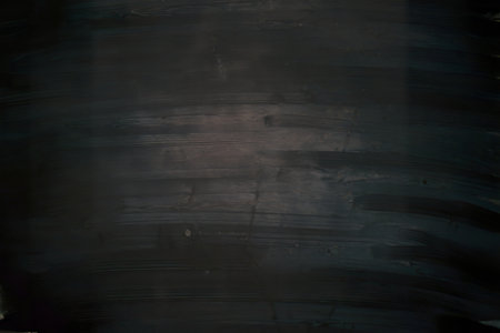 A photo of a dark, almost black, expanse that covers a canvas or a wall.の写真素材