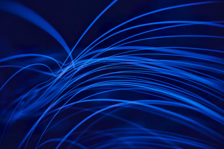 a vibrant, abstract display of blue neon linesの写真素材