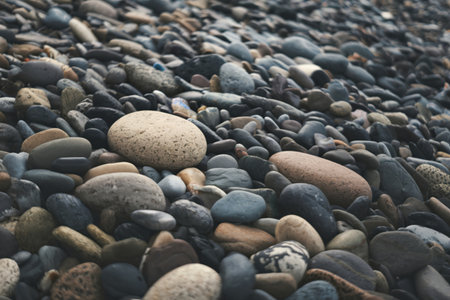 a variety of smooth, rounded pebbles and stonesの写真素材