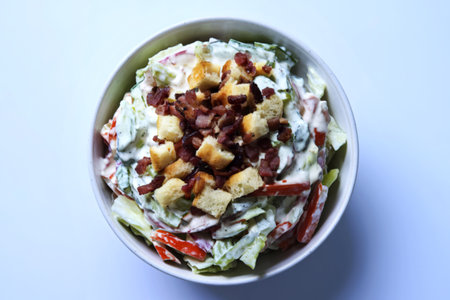 a bowl of salad with vegetables.の写真素材