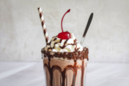 A photograph of a creamy strawberry milkshakeの写真素材