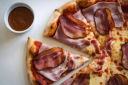 a pizza with melted cheeseの写真素材