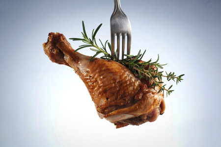 A photograph of a perfectly roasted chicken legの写真素材