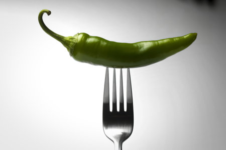 green chili pepper isolated on a white backgroundの写真素材