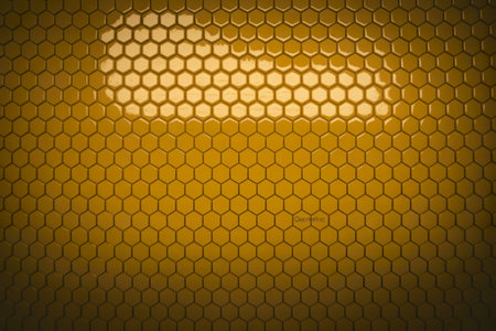 A 3d rendering of a hexagonal texture in a bright yellow color