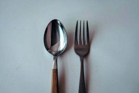 A photo of a spoon and fork