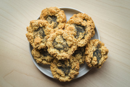 crumbly biscuits generously sprinkled with poppy seedsの写真素材