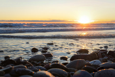 A beach scene during sunsetの写真素材