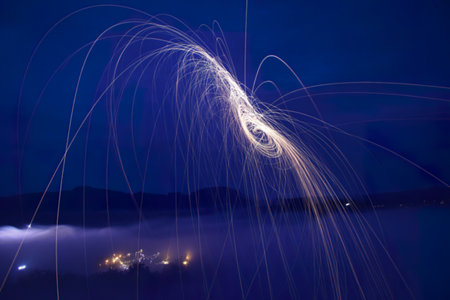 swirling silver light trailsの写真素材