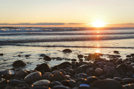 A beach scene during sunsetの写真素材