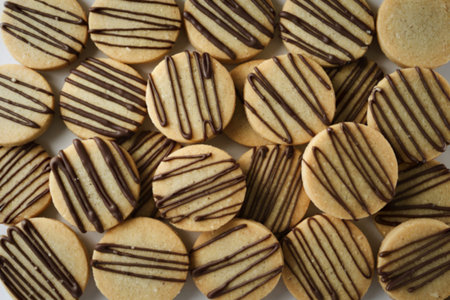 a collection of round, shortbread-like cookies