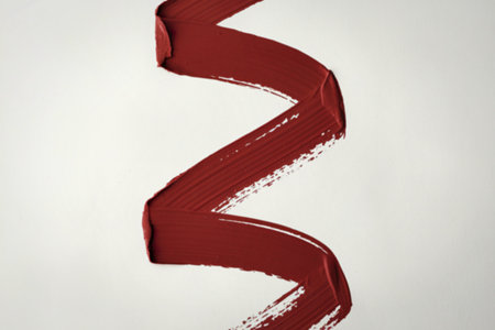 a bold, red lipstick strokeの写真素材