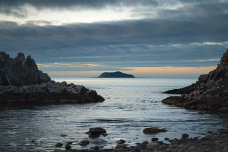 a serene coastal scene with rugged rocksの写真素材