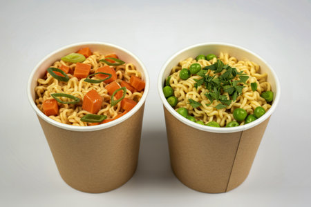 two cups with noodlesの写真素材