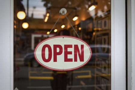 a classic circular shop sign OPENの写真素材