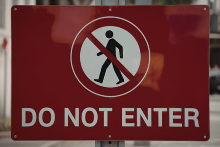 A photograph of a bright red rectangular signboard