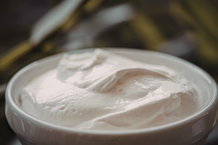 A photo of a close-up shot of a bowl of fresh sour cream