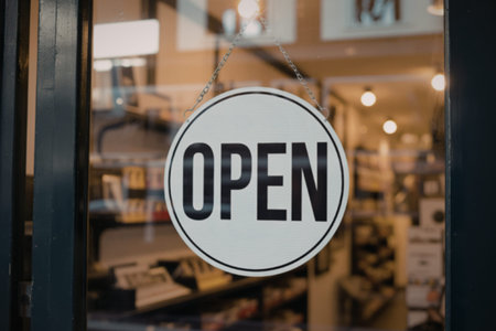 A photograph of a classic circular shop sign OPEN