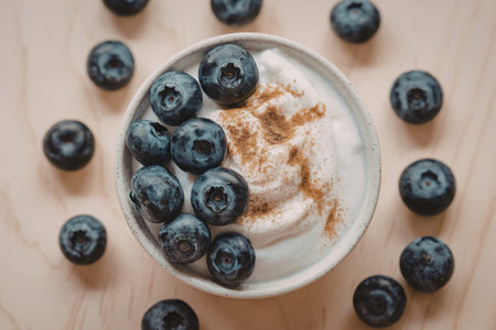 A photo of a healthy fresh blueberry yogurt in a bowl.の写真素材