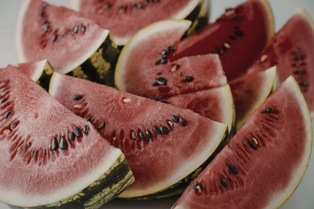 A photo of fresh ripe red watermelon slicesの写真素材