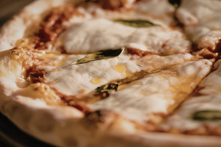 a freshly baked pizza with a golden-brown crustの写真素材