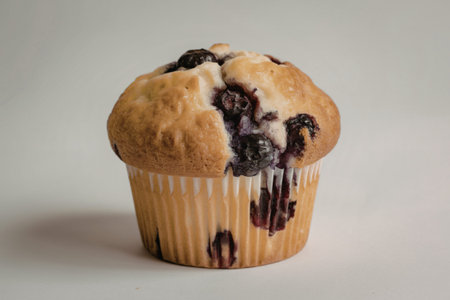 A photograph of a freshly baked blueberry muffinの写真素材
