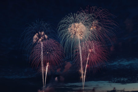 A spectacular nighttime photograph of vibrant fireworksの写真素材