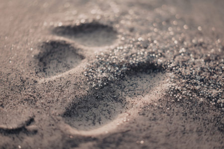 a textured background with silver grain glitterの写真素材