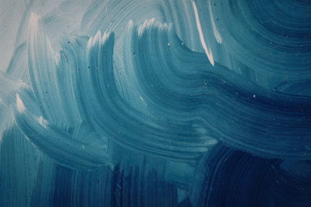 a vibrant and textured blue background with swirling patternsの写真素材