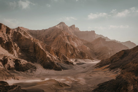 mountainous landscape surrounded by a vast desert environment