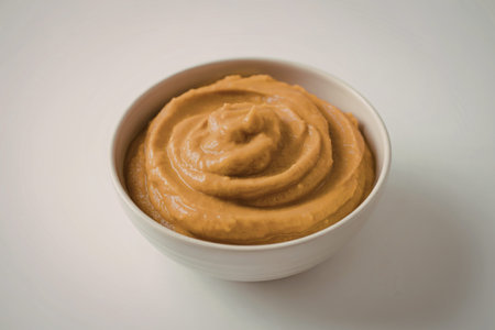 A photo of a bowl containing a puree made from fresh pumpkin