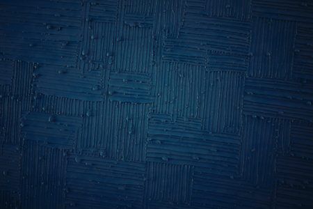 a textured surface with a deep blue hueの写真素材