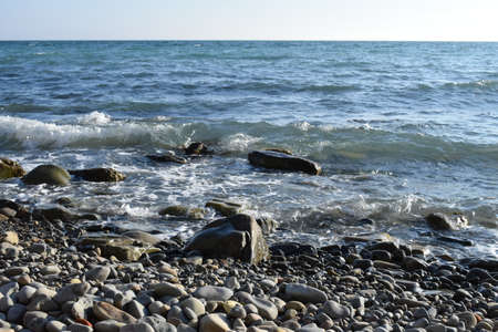 Black sea. Beautiful seascape. Pebble beach.の写真素材