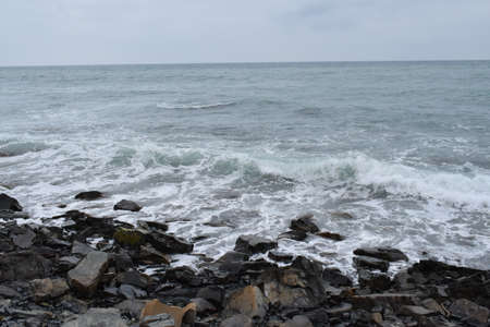 Beautiful seascape. Black Sea. Waves. Pebble beach.の写真素材