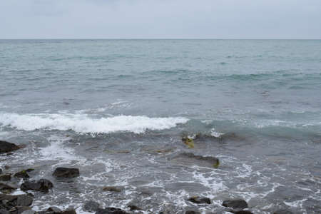 Beautiful seascape. Black Sea. Waves. Pebble beach.の写真素材