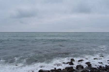 Beautiful seascape. Black Sea. Waves. Pebble beach.の写真素材