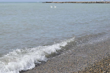Black sea, pebble beach. Anapa resort town, summer.の写真素材