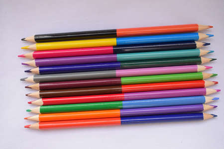 Stationery. Pencils of different colors on a white background. The view from the top.の写真素材