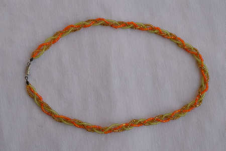 Beautiful beaded necklace. Handmade decoration. Blue and white colors.の写真素材