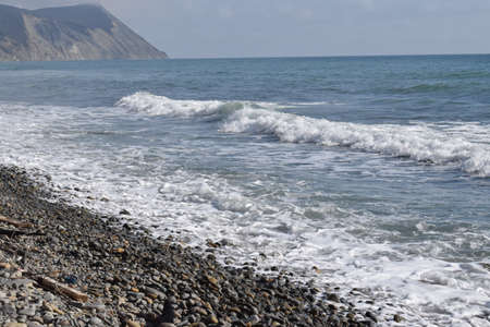 View of the Black Sea, beach and mountains. The resort town of Anapa. Russia. Photo taken in spring.の写真素材