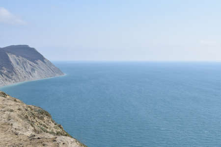 View of the Black Sea, beach and mountains. The resort town of Anapa. Russia. Photo taken in spring.の写真素材