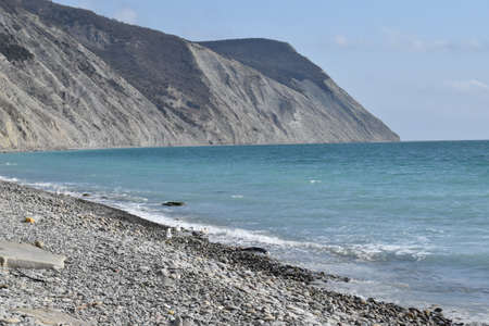 Types of the Black Sea. The outskirts of Anapa. Mountains and rocks, pebble beach, seagulls.の写真素材